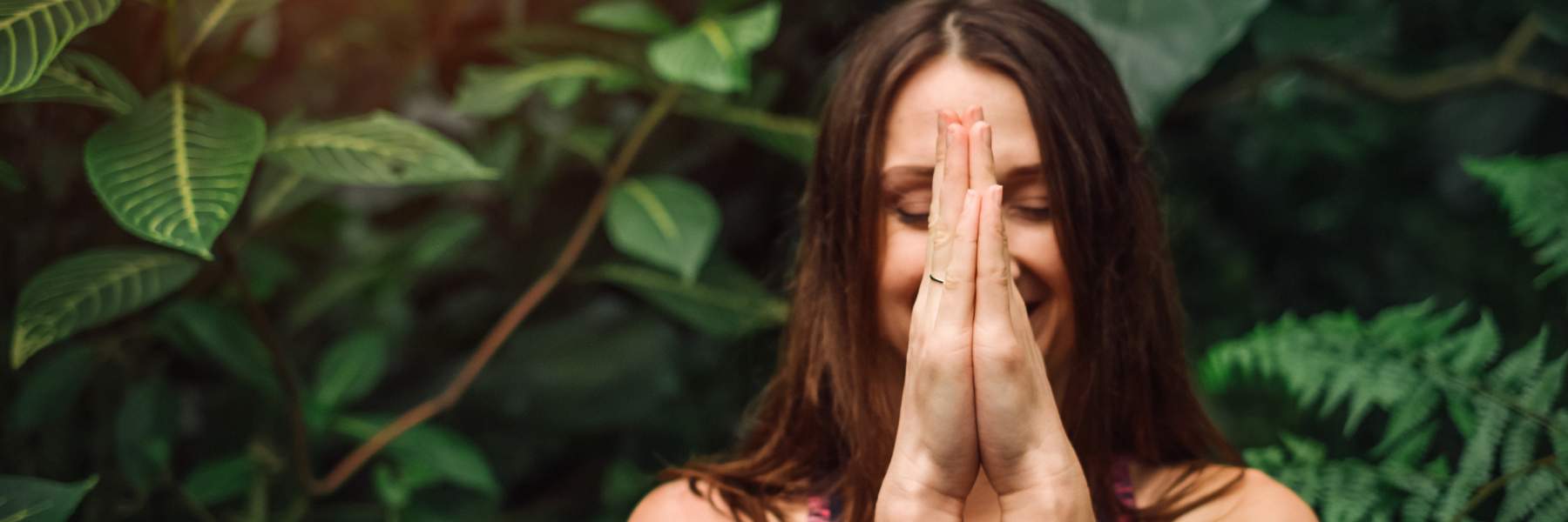 Woman meditating for endo symptoms