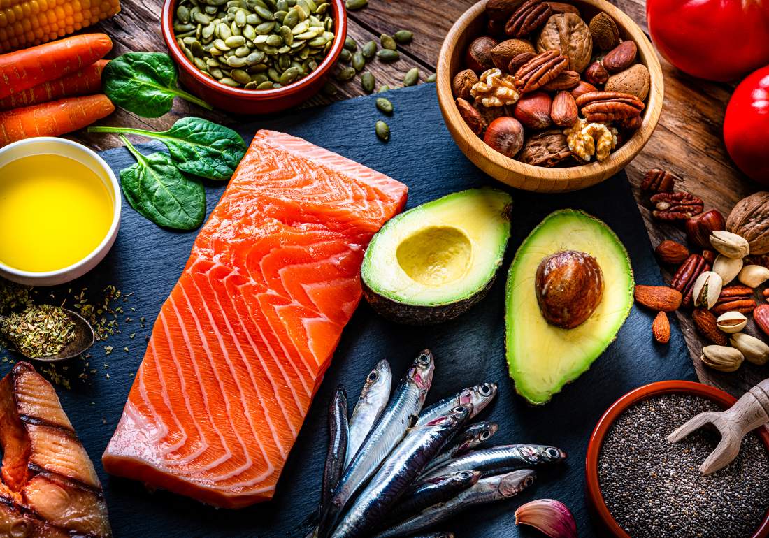 Healthy food selection containing omega 3 fish nuts avocado