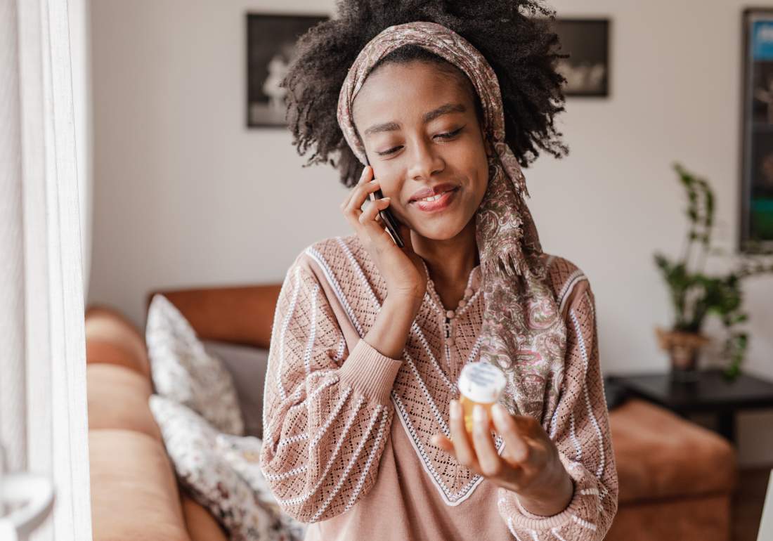 Woman taking medication for endo symptoms