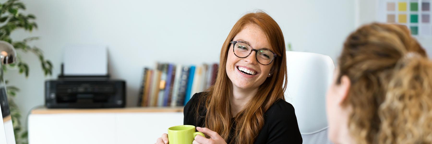 Girl talking openly with boss at work about her endo syptoms
