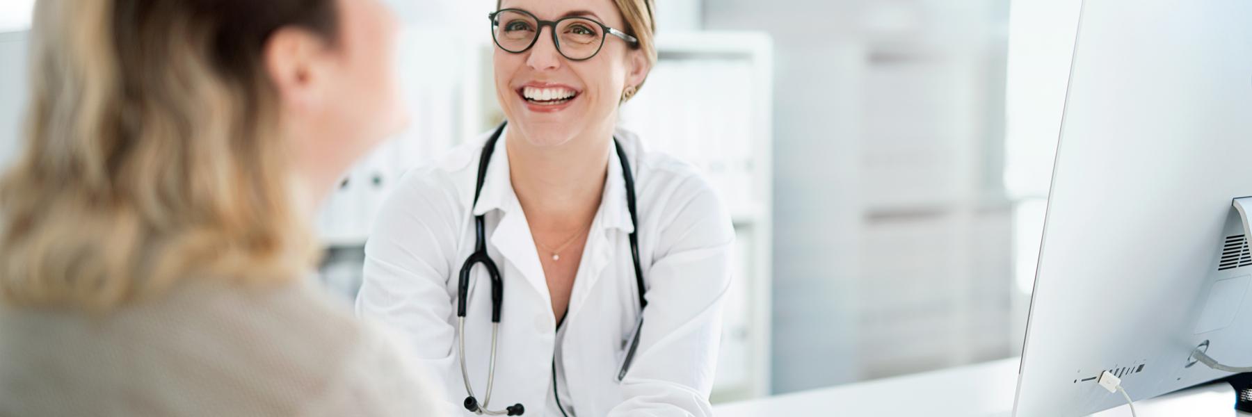 Doctor talking with patient