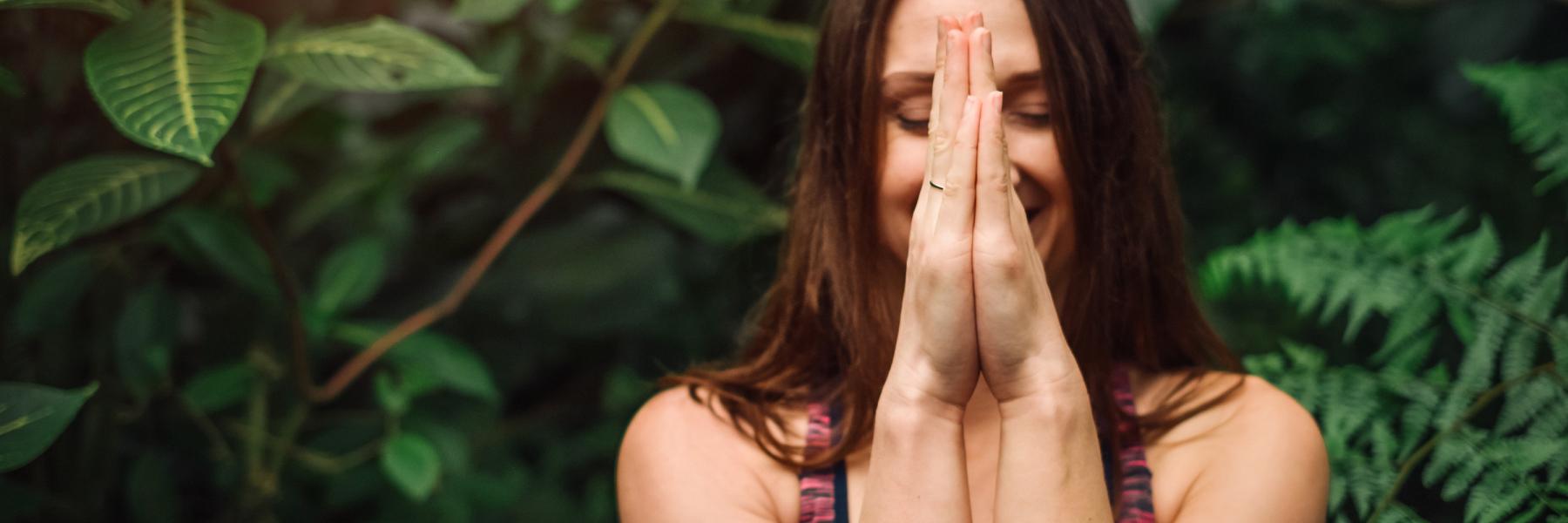 Woman meditating for endo symptoms