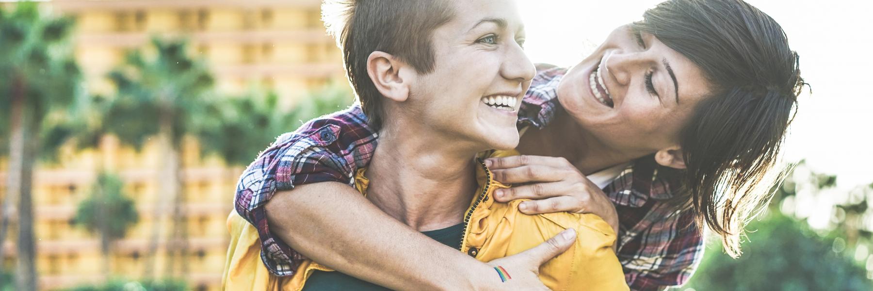 Lesbian couple happy and cuddling