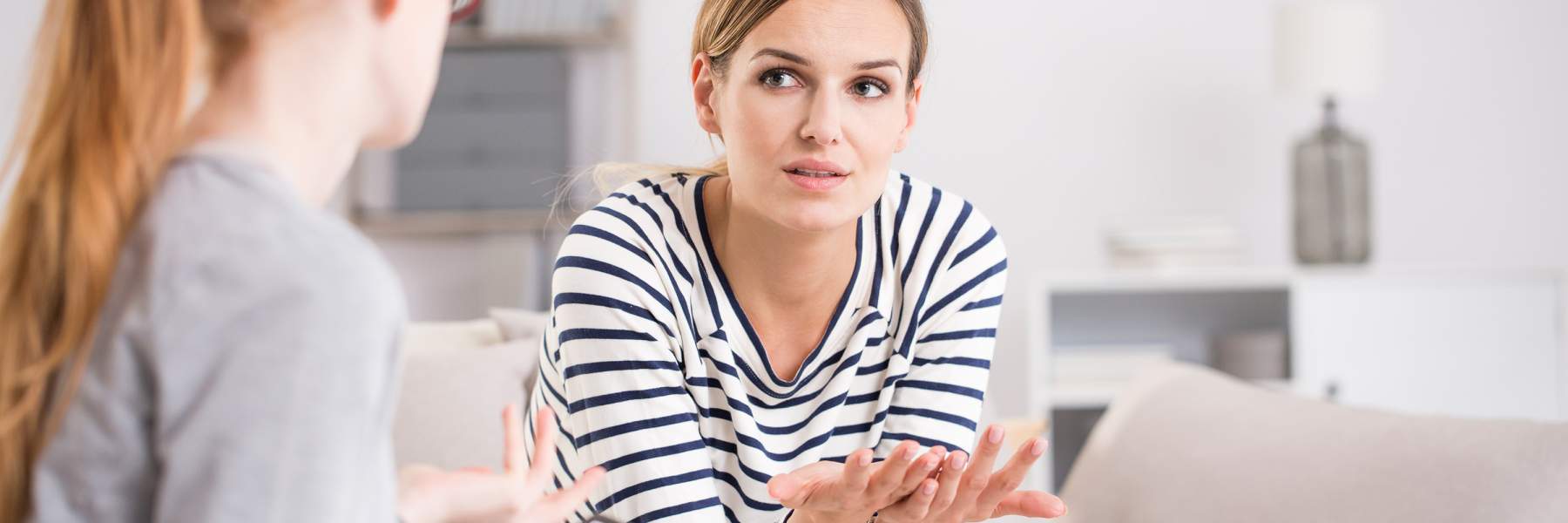 Woman holding hands out frustratedly